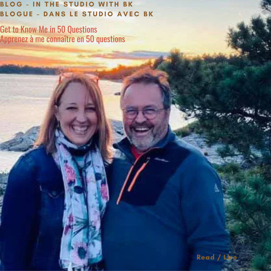 Canadian watercolour artist Brigitte Klassen and her husband smiling at sunset by a lake in Northern Ontario