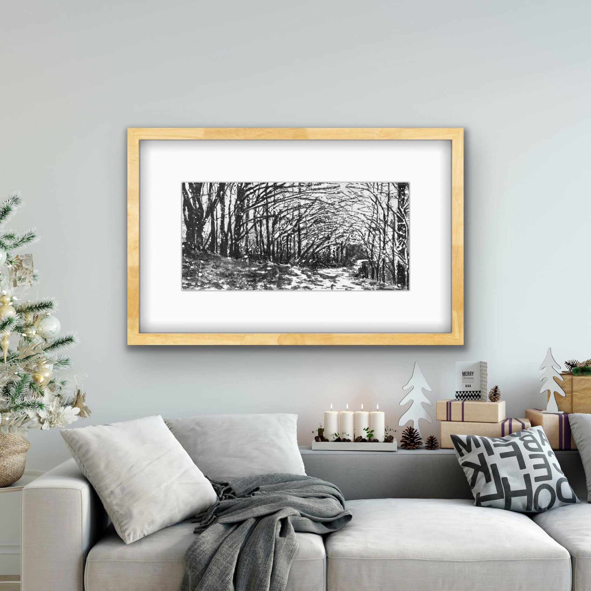 Cold November black and white forest print displayed in modern room setting by Canadian watercolour artist Brigitte Klassen.